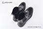Prada Classic Smooth Black Calfskin Boot with the Iconic Enameled Metal Triangle Logo
