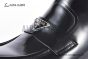 Prada Classic Smooth Black Calfskin Boot with the Iconic Enameled Metal Triangle Logo