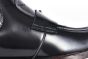 Prada Classic Smooth Black Calfskin Boot with the Iconic Enameled Metal Triangle Logo