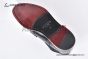 Prada Classic Smooth Black Calfskin Boot with the Iconic Enameled Metal Triangle Logo