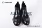 Prada Classic Smooth Matte Black Calfskin Boot with the Iconic Enameled Metal Triangle Logo