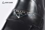Prada Classic Smooth Matte Black Calfskin Boot with the Iconic Enameled Metal Triangle Logo