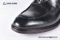 Prada Classic Smooth Matte Black Calfskin Boot with the Iconic Enameled Metal Triangle Logo