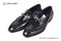 Ferragamo Black Calfskin Moccasin with Gancini Ornament and Unique Sutures