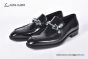 Ferragamo Black Calfskin Moccasin with Gancini Ornament and Unique Sutures
