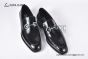 Ferragamo Black Calfskin Moccasin with Gancini Ornament and Unique Sutures