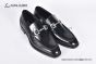 Ferragamo Black Calfskin Moccasin with Gancini Ornament and Unique Sutures
