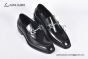 Ferragamo Black Calfskin Moccasin with Gancini Ornament and Unique Sutures