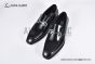 Ferragamo Black Calfskin Moccasin with Gancini Ornament and Unique Sutures