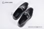 Ferragamo Black Calfskin Moccasin with Gancini Ornament and Unique Sutures