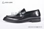 Ferragamo Black Calfskin Moccasin with Gancini Ornament and Unique Sutures