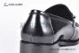 Ferragamo Black Calfskin Moccasin with Gancini Ornament and Unique Sutures