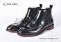 Prada Classic Brushed Black Calfskin Boot with the Iconic Enameled Metal Triangle Logo